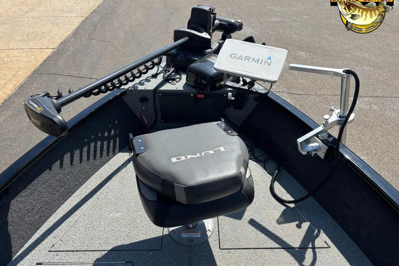 Slide: The Image of 2023 Lund 1650 Rebel XL SS boat interior with Garmin equipment and Minn Kota trolling motor. - 7