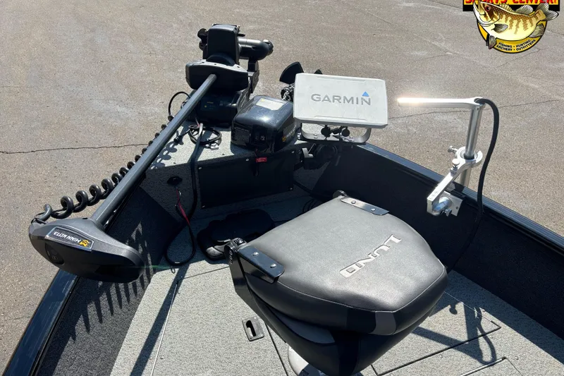 Slide: The Image of 2023 Lund 1650 Rebel XL SS boat interior with Garmin equipment and Minn Kota trolling motor. - 8