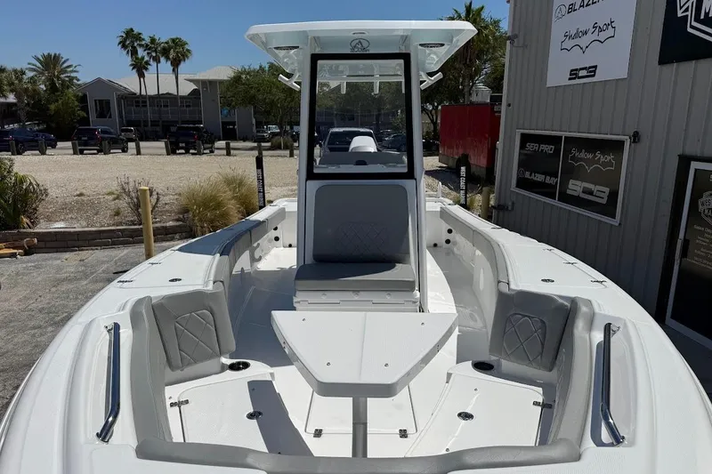 Slide: The Image of 2026 Blazer Bay Makaira 2600 boat with sleek design and spacious seating area. - 3
