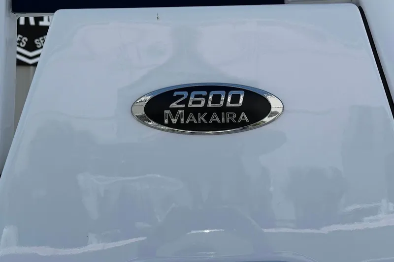 Slide: The Image of 2026 Blazer Bay Makaira 2600 emblem on a sleek white surface. - 5