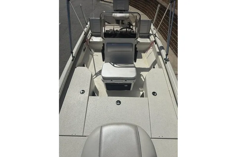 Slide: The Image of 2020 Ranger RB190 boat interior with seating and storage compartments. - 8