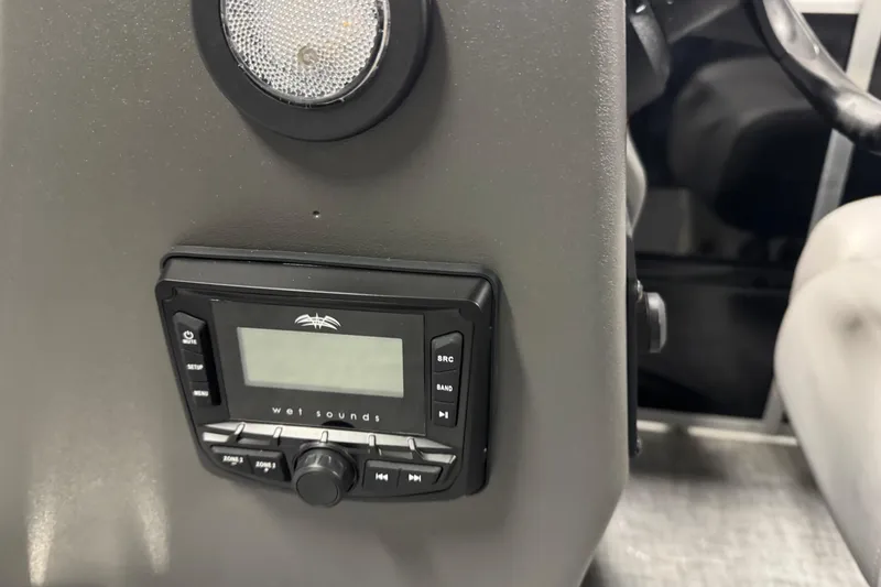Slide: The Image of 2026 Sun Tracker Party Barge 16 DLX audio system with Wet Sounds control panel. - 12