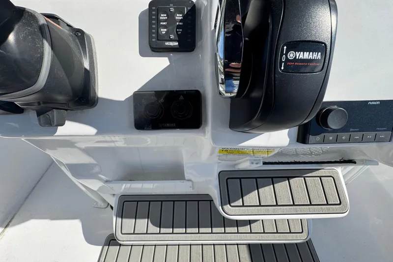 Slide: The Image of Control panel of 2026 Tidewater 220 CC Adventure boat with Yamaha remote control. - 14