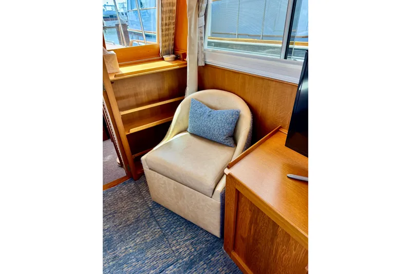 Slide: The Image of Cozy seating area in 1996 Grand Banks 46 Heritage CL yacht interior. - 21