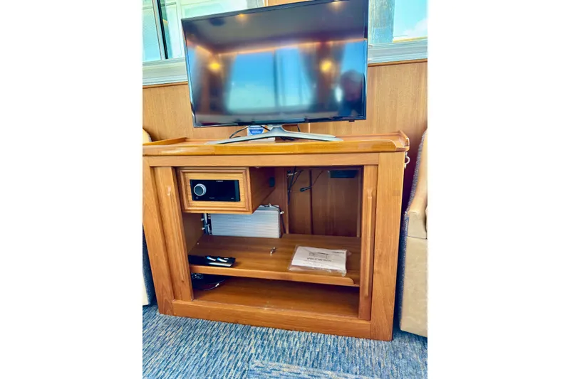 Slide: The Image of Wooden entertainment cabinet with TV and stereo on a 1996 Grand Banks 46 Heritage CL yacht. - 23