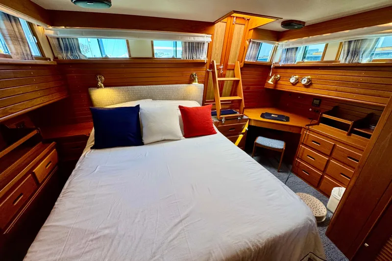 Slide: The Image of Cozy cabin interior of 1996 Grand Banks 46 Heritage CL yacht with wooden furnishings. - 29