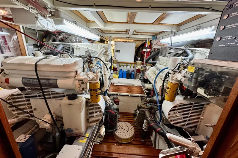 Slide: The Image of Engine room of 1996 Grand Banks 46 Heritage CL yacht, showcasing machinery and equipment. - 67