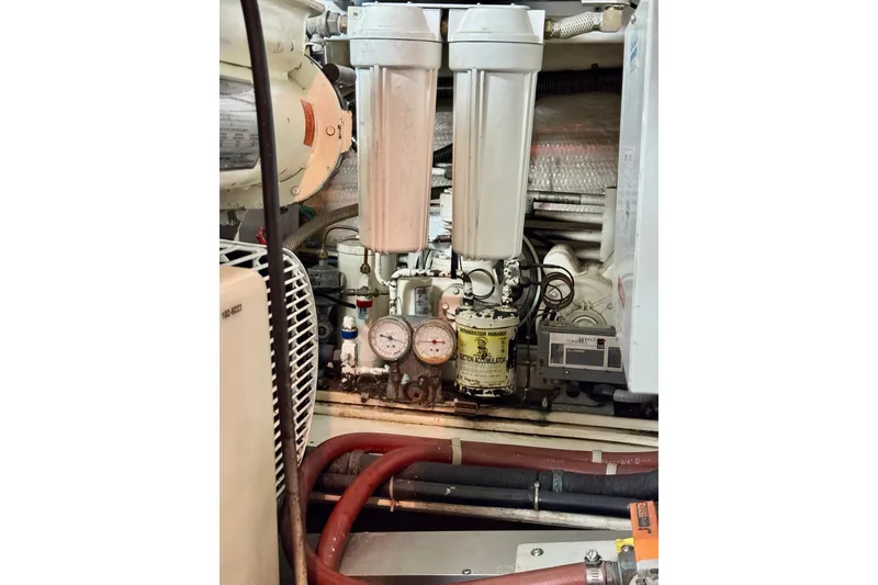 Slide: The Image of Engine room of 1996 Grand Banks 46 Heritage CL with filtration system and gauges. - 69