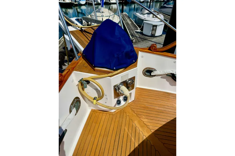 Slide: The Image of Deck area of 1996 Grand Banks 46 Heritage CL with nautical equipment. - 87