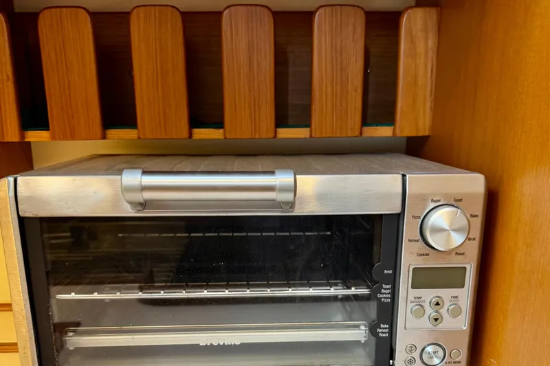 Slide: The Image of Toaster oven in wooden kitchen cabinet on Grand Banks 46 Heritage CL yacht. - 92