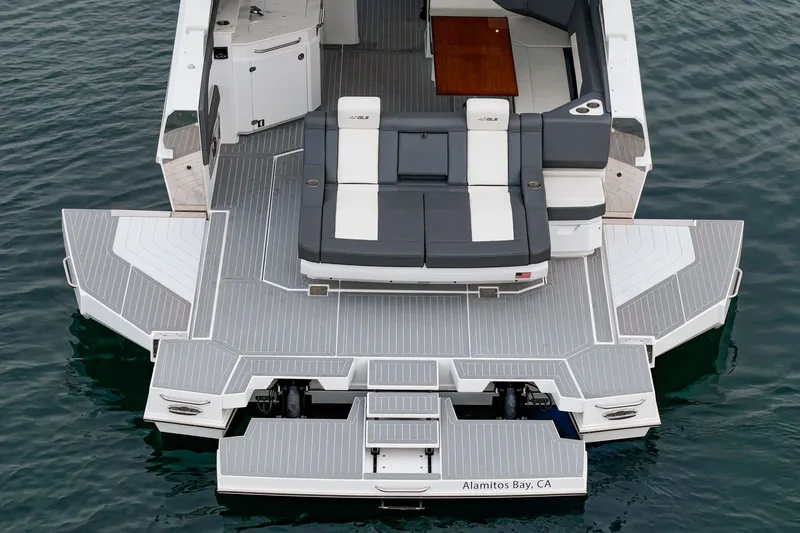 Slide: The Image of Rear view of 2022 Cruisers 42 GLS yacht on water. - 22