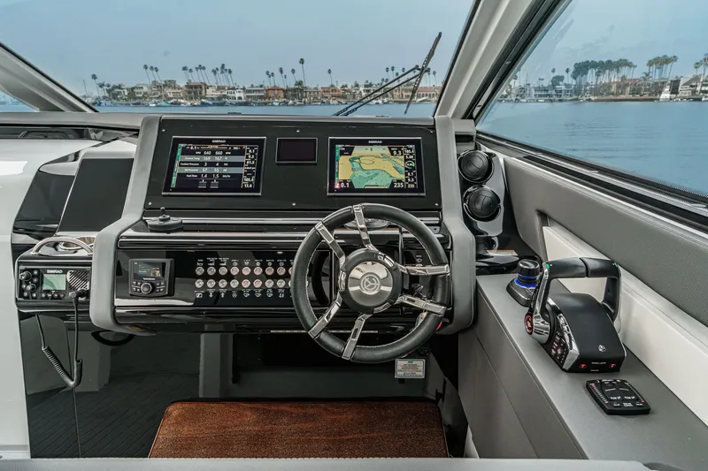 Slide: The Image of Cockpit of 2022 Cruisers 42 GLS with modern navigation technology. - 39