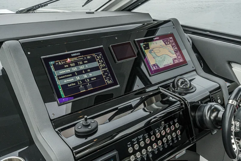 Slide: The Image of Cockpit of 2022 Cruisers 42 GLS with modern navigation systems. - 40