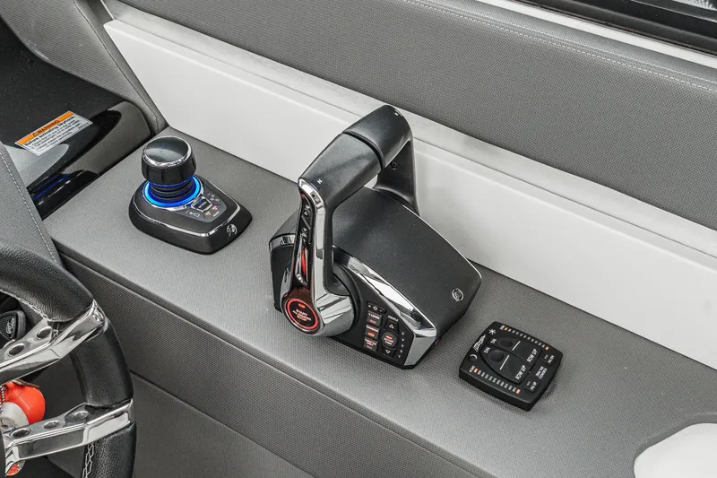 Slide: The Image of Cruisers 42 GLS 2022 helm with joystick and controls. - 41