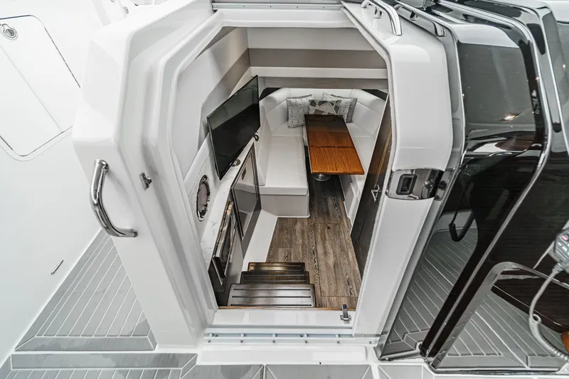 Slide: The Image of Interior of 2022 Cruisers 42 GLS yacht with modern amenities. - 42