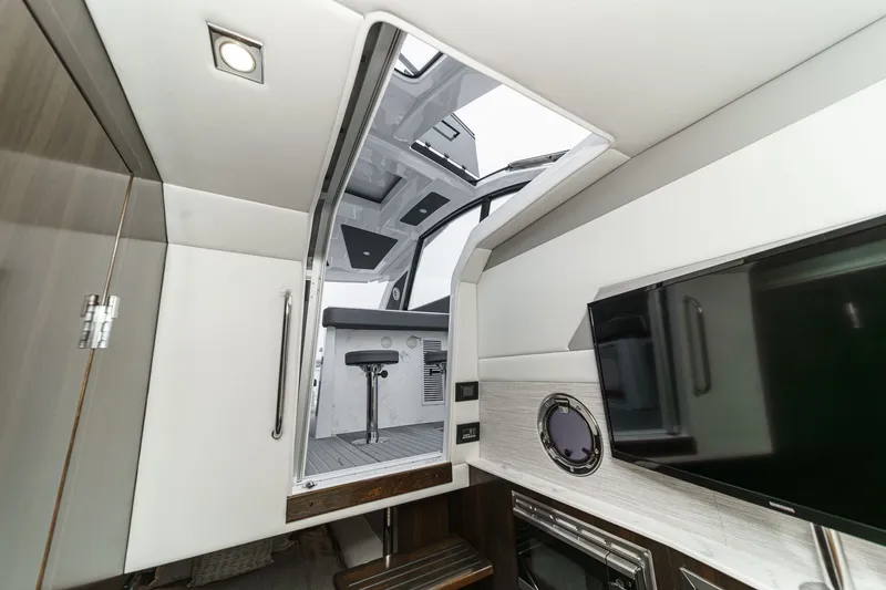 Slide: The Image of Interior of 2022 Cruisers 42 GLS yacht with modern design. - 43
