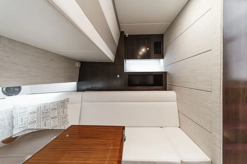Slide: The Image of Interior of 2022 Cruisers 42 GLS yacht with elegant seating area. - 48