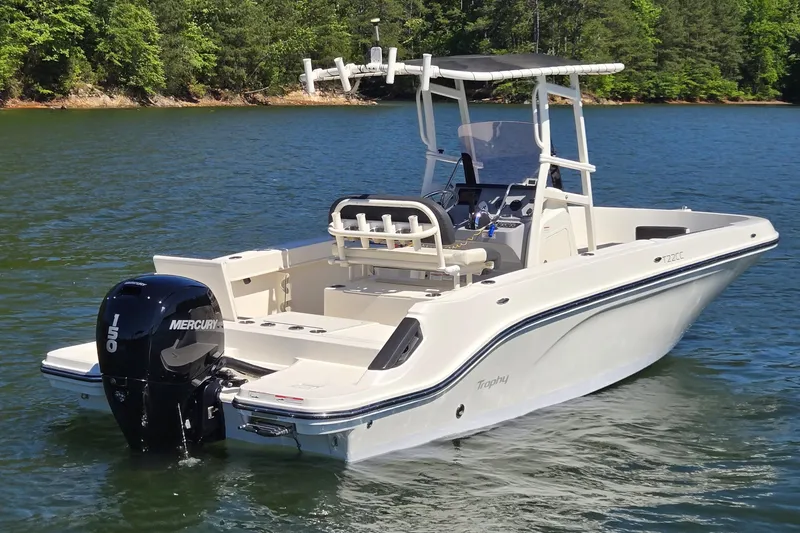 Slide: The Image of 2023 Bayliner Trophy T22CC boat on water, featuring a Mercury 150 outboard motor. - 8