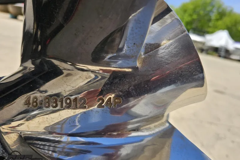 Slide: The Image of Close-up of a Baja 27 Outlaw 2019 boat propeller with engraved numbers. - 29