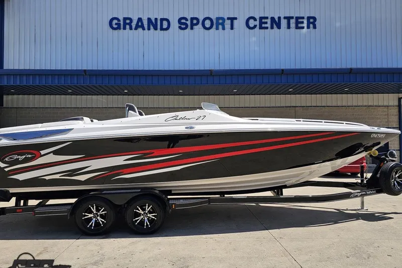 Slide: The Image of 2019 Baja 27 Outlaw boat displayed at Grand Sport Center. - 3