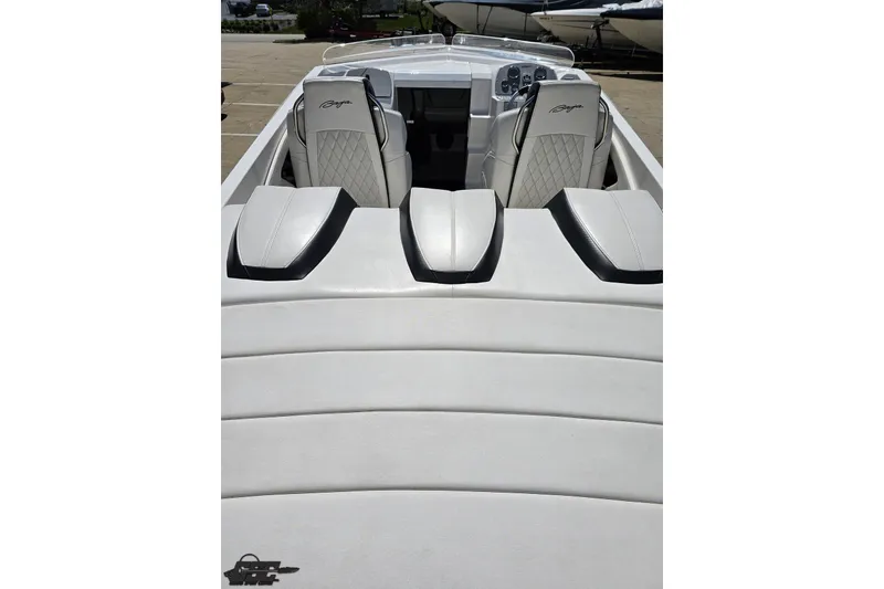 Slide: The Image of 2019 Baja 27 Outlaw boat interior with white leather seats and dashboard view. - 35