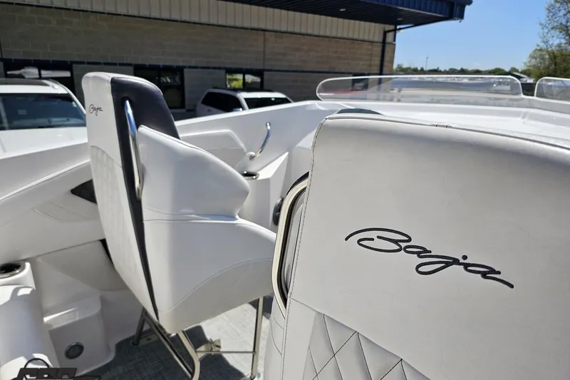 Slide: The Image of 2019 Baja 27 Outlaw boat interior with branded white seating. - 40