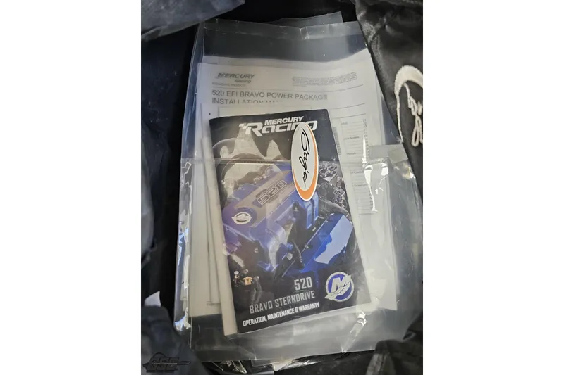 Slide: The Image of Manuals for Mercury Racing 520 EFI Bravo, Baja 27 Outlaw 2019 boat. - 56
