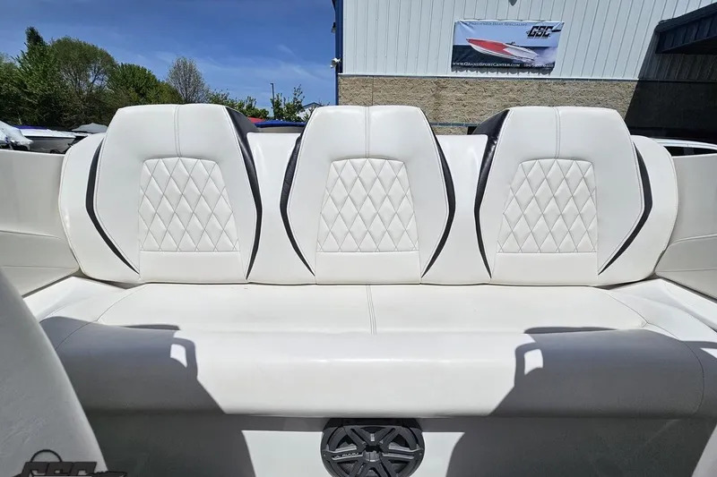Slide: The Image of 2019 Baja 27 Outlaw boat interior with white diamond-stitched seating. - 63