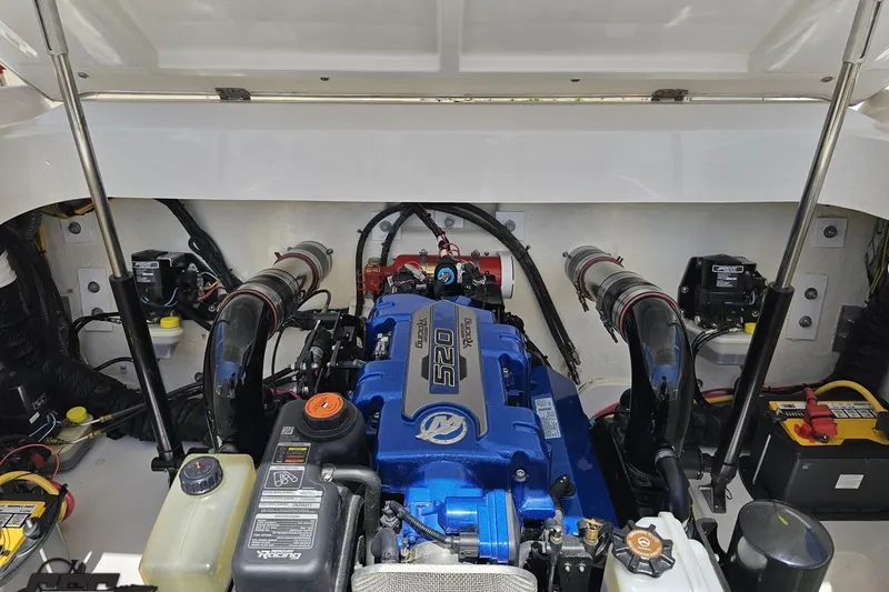 Slide: The Image of 2019 Baja 27 Outlaw engine compartment with powerful 520 EFI engine and components. - 72