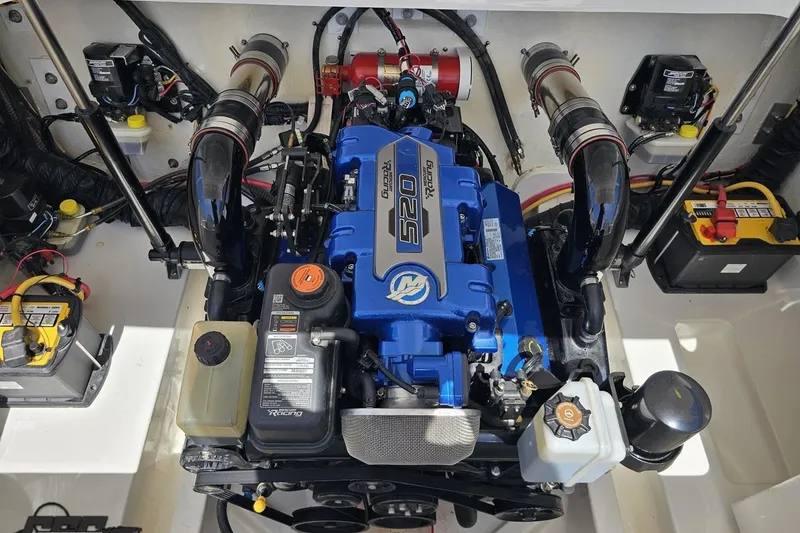 Slide: The Image of 2019 Baja 27 Outlaw engine compartment with blue Mercury Racing 520 engine. - 73