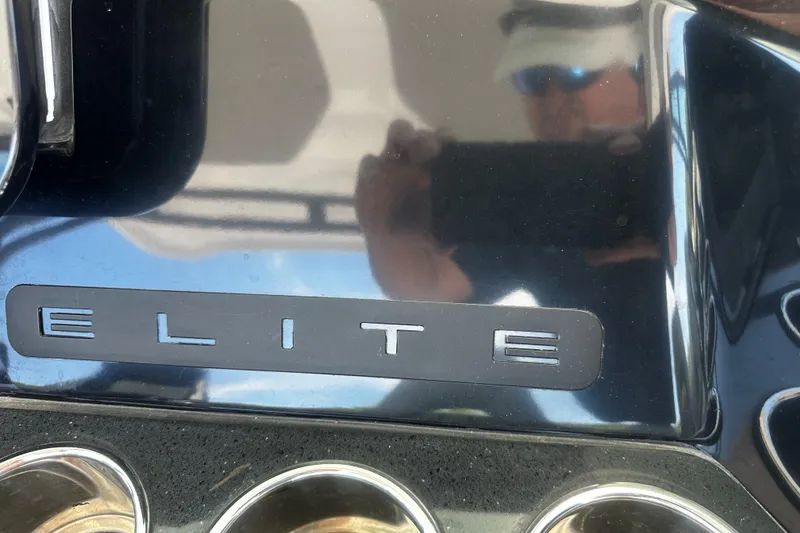 Slide: The Image of 2026 Monterey Elite 30 OB dashboard with "Elite" emblem and reflection. - 10