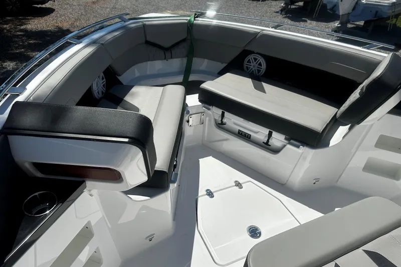 Slide: The Image of Luxurious seating area on the 2026 Monterey Elite 30 OB boat, featuring modern design and comfort. - 14