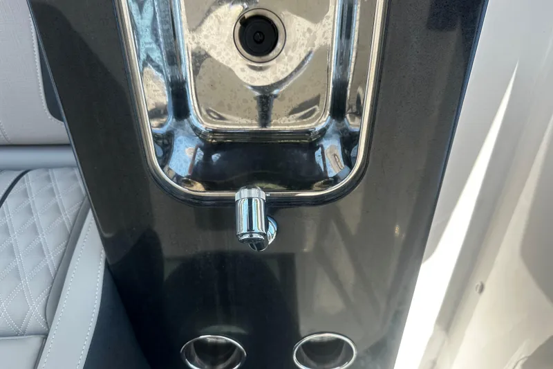 Slide: The Image of Luxury interior detail of 2026 Monterey Elite 30 OB boat with sleek sink design. - 9