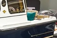 Slide: The Image of 2025 Ranger Tug R23 Luxury Edition boat with sleek design and modern features. - 14