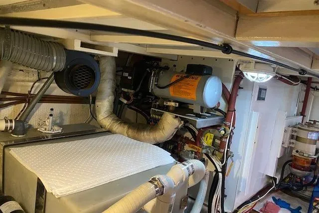 Slide: The Image of Engine room of 2000 Grand Banks 36 Classic with visible machinery and piping. - 21