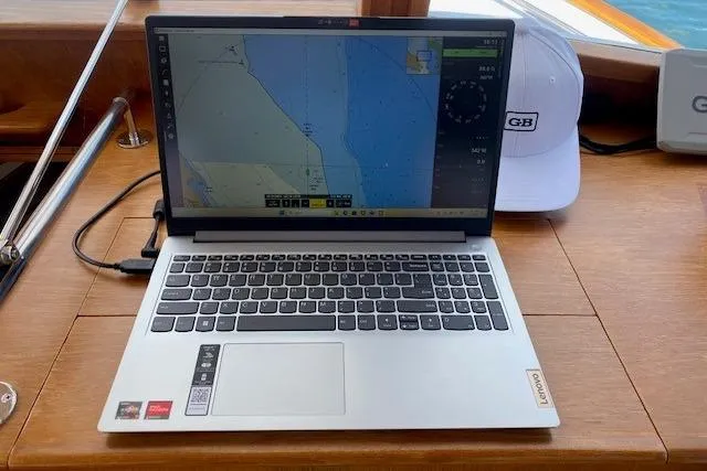 Slide: The Image of Laptop displaying navigation software on Grand Banks 36 Classic yacht, 2000 model. - 5