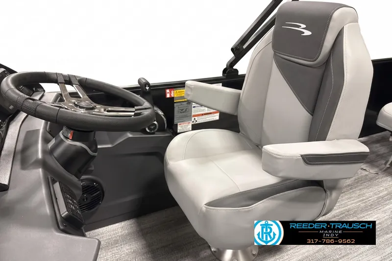 Slide: The Image of Captain's chair and steering wheel of 2026 Bennington 188 SF boat, featuring sleek design. - 3