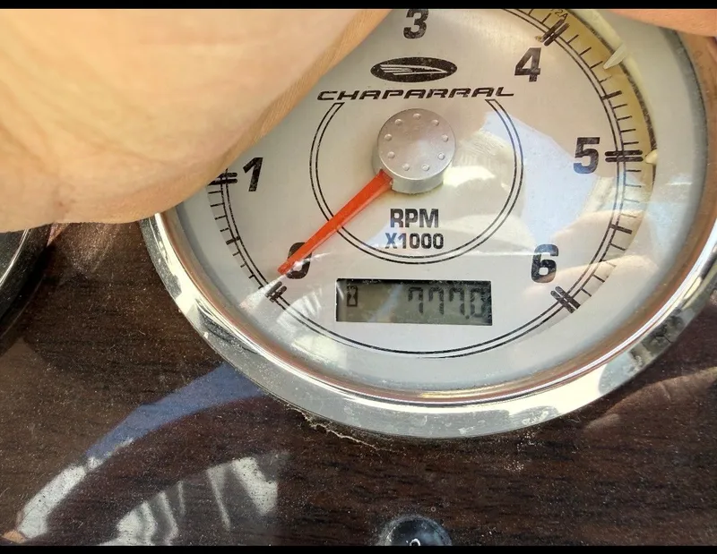 Slide: The Image of Tachometer of a 2004 Chaparral 256 SSi boat, displaying 777 hours. - 15