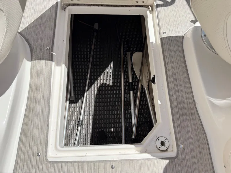 Slide: The Image of Storage compartment in 2004 Chaparral 256 SSi boat. - 22
