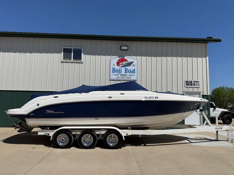 Slide: The Image of 2004 Chaparral 256 SSi boat on trailer in front of Boji Boat building. - 30