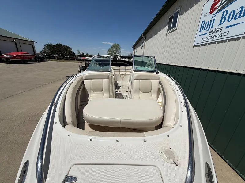 Slide: The Image of 2004 Chaparral 256 SSi boat parked at Boji Boats dealership. - 4
