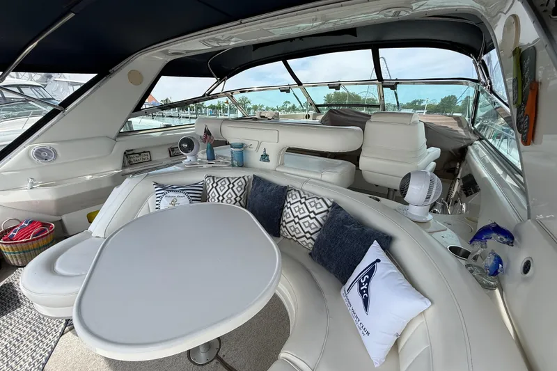 Slide: The Image of Luxurious interior of a 1998 Sea Ray 500 Sundancer yacht with plush seating and stylish decor. - 14