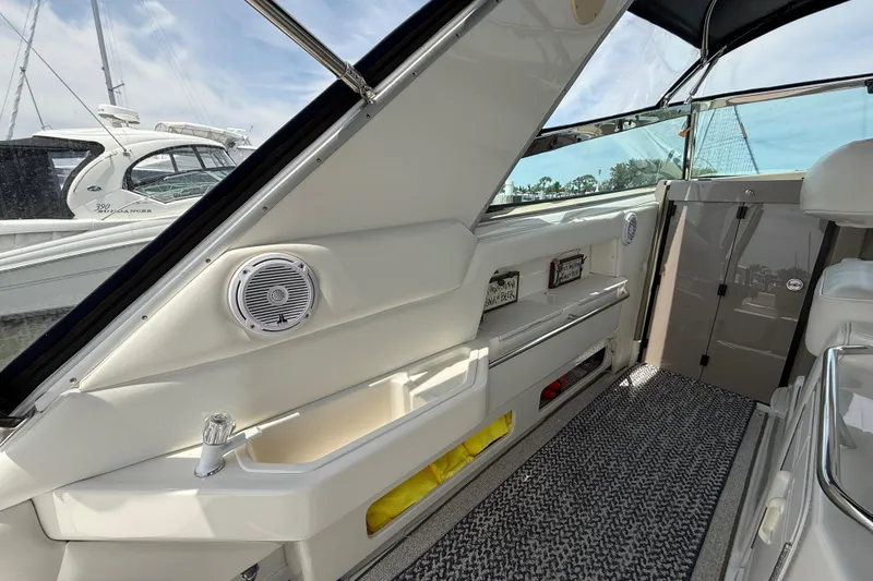 Slide: The Image of Interior view of a 1998 Sea Ray 500 Sundancer yacht, featuring sleek design and modern amenities. - 18