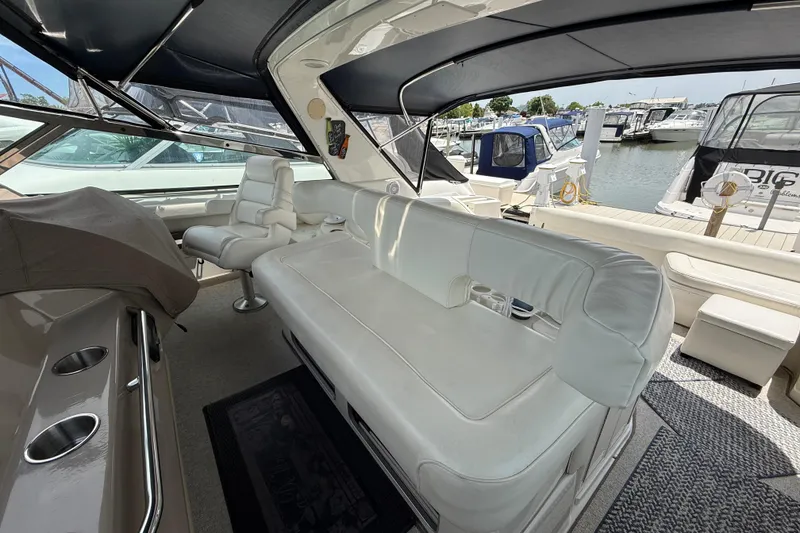 Slide: The Image of Luxurious interior of a 1998 Sea Ray 500 Sundancer yacht at a marina. - 22