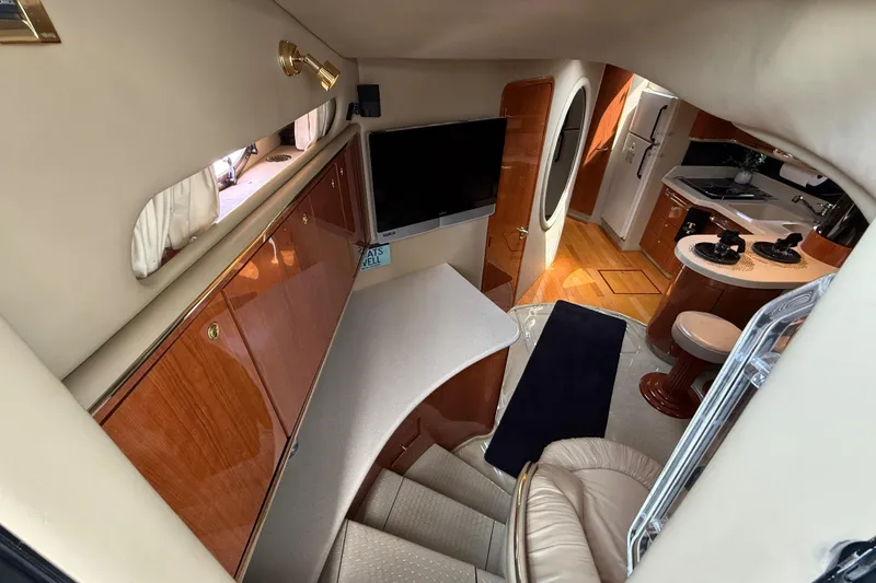 Slide: The Image of Luxurious interior of a 1998 Sea Ray 500 Sundancer yacht with modern amenities. - 37