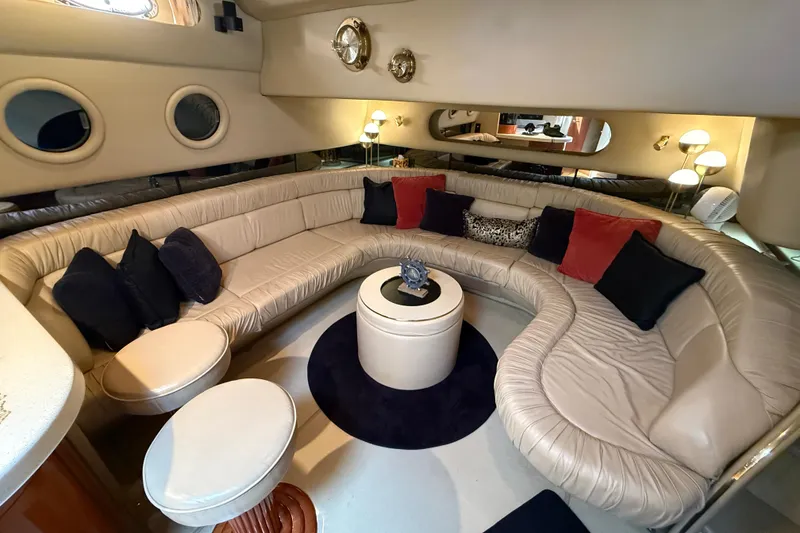 Slide: The Image of Luxurious interior of a 1998 Sea Ray 500 Sundancer yacht with plush seating and elegant decor. - 40