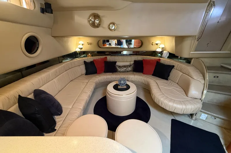 Slide: The Image of Luxurious interior of a 1998 Sea Ray 500 Sundancer yacht with plush seating and elegant decor. - 41
