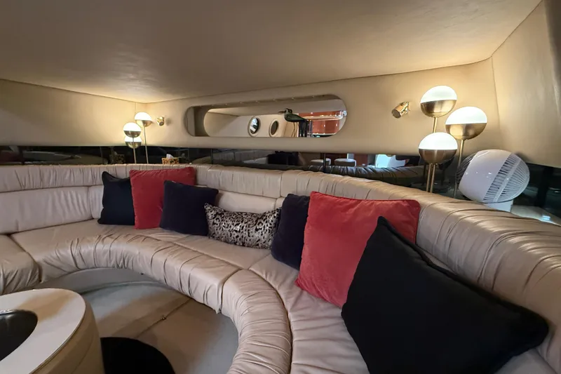 Slide: The Image of Luxurious interior of 1998 Sea Ray 500 Sundancer yacht with plush seating and elegant lighting. - 42