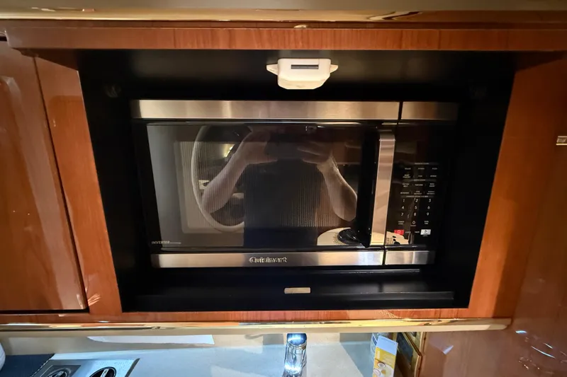 Slide: The Image of Built-in microwave in 1998 Sea Ray 500 Sundancer yacht kitchen. - 60