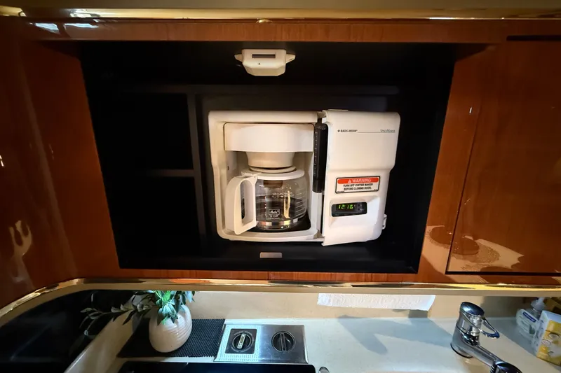 Slide: The Image of Built-in coffee maker in 1998 Sea Ray 500 Sundancer yacht kitchen. - 61